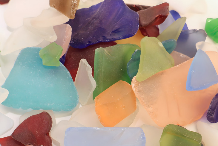 Colorful repurposed glass materials used by CraftED.